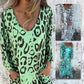 Vestido fluido estampado con cuello en V y bolsillos
