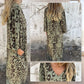 Vestido fluido estampado con cuello en V y bolsillos